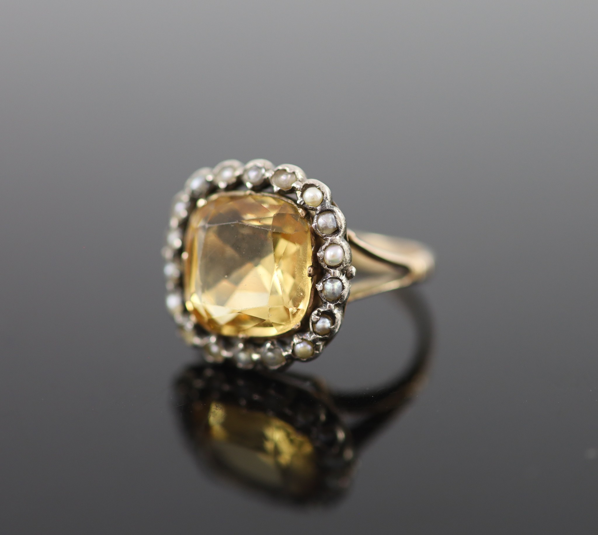 A 19th century gold, citrine and seed pearl set shaped square cluster ring